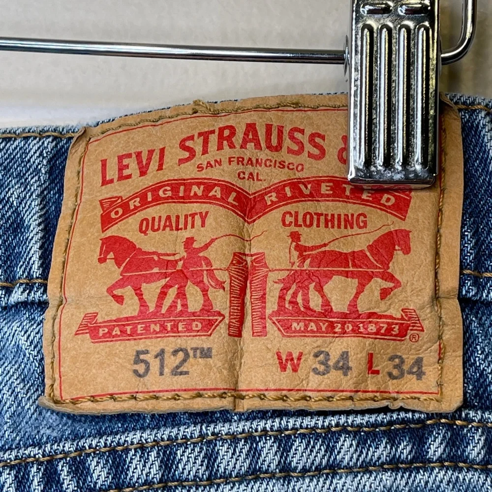 Levi’s 512 Perfect Medium Wash Factory Distressed High Rise Slim Tapered Jeans